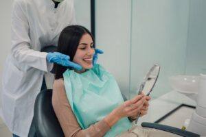 A woman in a dental chair.