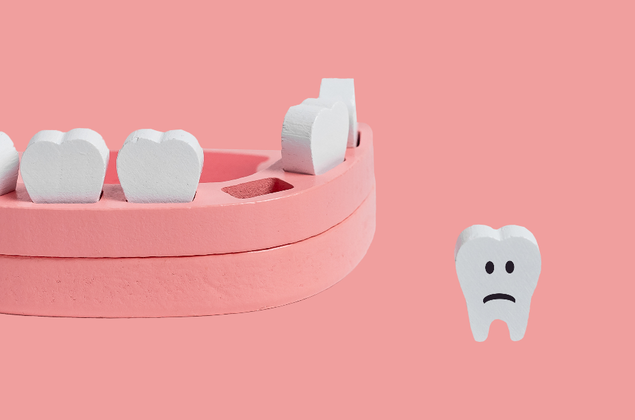 Cartoon tooth with frowny face standing near empty spot in mouth